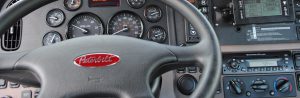 Behind the wheel of a Peterbilt tractor
