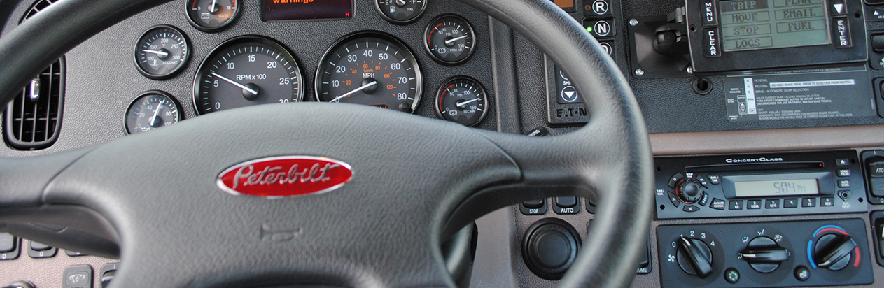 Behind the wheel of a Peterbilt tractor